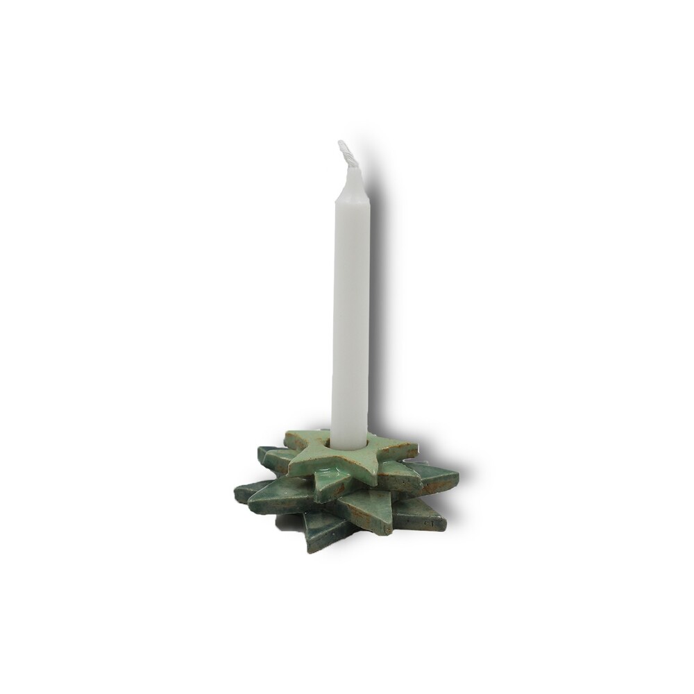 Kerzenständer in Form von Sternen